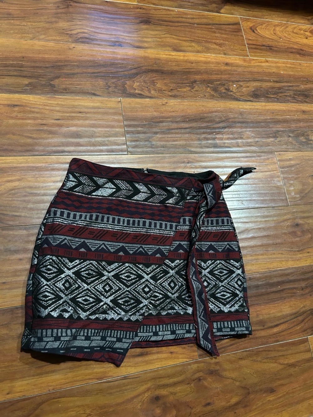 Express burgundy, black, and silver Tribal theme Skirt, size 4